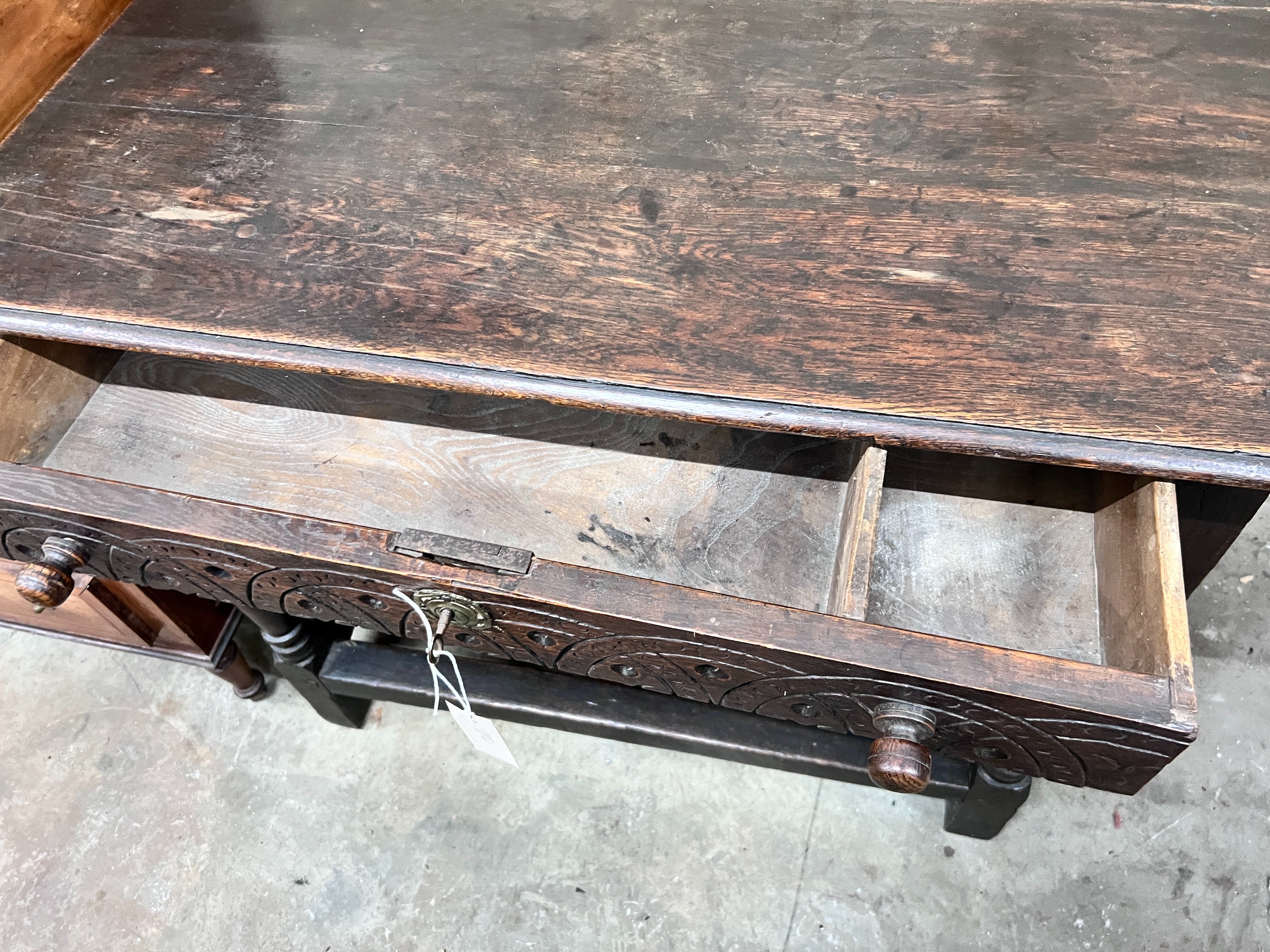 A 17th century style oak side table, width 100cm *Please note the sale commences at 9am.